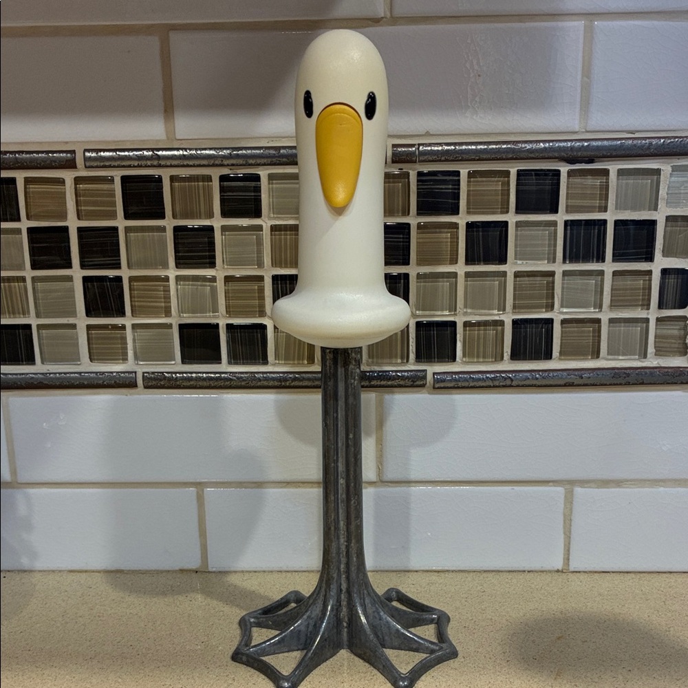 Duck-Shaped Cream and Gray food masher